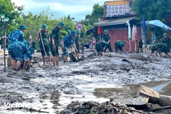 Military uniforms in the heart of Da Nang’s Hoi An ancient streets