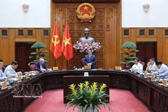 Prime Minister Pham Minh Chinh chairs the meeting on April 1. (Photo: VNA)