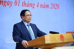 Prime Minister Pham Minh Chinh speaks at the meeting on disaster response in Hanoi on April 1 (Photo: VNA)