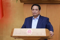 Prime Minister Pham Minh Chinh chairs a thematic government session on the International Financial Centre in Vietnam. (Photo: VNA)