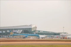 A wide-body Boeing 787-9 aircraft operated by Vietnam Airlines lands safely at Long Thanh International Airport in a test flight on December 15. (Photo: VNA)