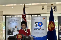 Ambassador Ton Thi Ngoc Huong, Permanent Representative of Vietnam to ASEAN, speaks at the opening ceremony of the photo exhibition (Photo: VNA).