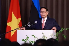 Prime Minister Pham Minh Chinh speaks at the Vietnam–Estonia business forum. (Photo: VNA(