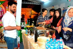 Tourists at the Hanoi Tourism Festival 2025 (Photo: qdnd.vn)