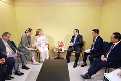 Vietnamese Prime Minister Pham Minh Chinh (third, right) meets with Peruvian President Dina Boluarte (third, left) on the sidelines of the 3rd United Nations Ocean Conference (UNOC 3) in Nice, France, on June 9 (local time). (Photo: VNA)