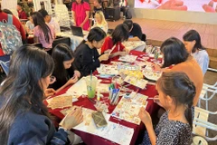 Young people enjoy the activities at Nguyen Van Binh book street. (Photo: ttbc-hcm.gov.vn)