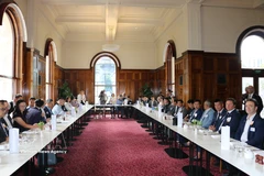 A roundtable between Vietnamese and Australian business communities at the Parliament House of Victoria. (Photo: VNA)