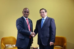 Prime Minister Pham Minh Chinh (R) and Prime Minister of the Solomon Islands Jeremiah Manele on the sidelines of the third United Nations Ocean Conference (UNOC 3) in Nice, France on June 9 (local time) (Photo: VNA)
