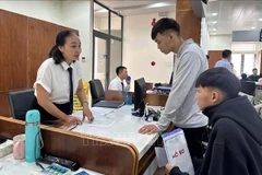 At a public service centre in Tam Ky ward, Da Nang city. (Photo: VNA)