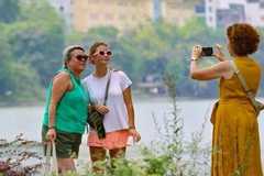 Hoan Kiem Lake, also known as the Returned Sword Lake, is the city's most renowned destinations (Photo: VNA)