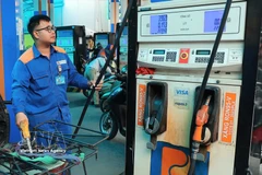 At a Petrolimex gas station (Photo: VNA)