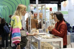 The Long Son JSC of Vietnam showcases organic cashew kernels and roasted cashews at Biofach 2026. (Photo: VNA)