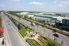 In 2008, the National Assembly approved a resolution to merge Ha Tay province, several communes from Hoa Binh province, and Me Linh district (formerly under Vinh Phuc) into the capital city of Hanoi. In the photo: The inter-communal road of Dan Phuong – the first news-style rural district of Hanoi. (Photo: VNA)
