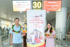 Passengers on the inaugural Hanoi- Xi’an flight. (Photo: Vietjet)