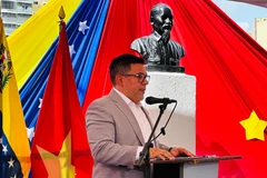 Nahum Fernández, Politburo member and Vice President of PSUV in charge of mass mobilisation speaks at event. (Photo: VNA)