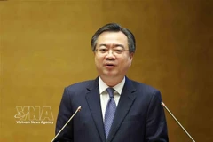 Politburo member, Secretary of the Party Central Committee and Chairman of its Commission for Policies and Strategies Nguyen Thanh Nghi speaks at the national conference disseminating and implementing the Resolution of the 14th National Party Congress in Hanoi on February 7. (Photo: VNA)