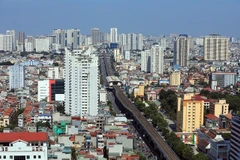 A view of the Hanoi skyline. While rental properties continue to be in demand, there has also been a notable rise in the number of foreigners looking to buy houses. (Photo: VNA)