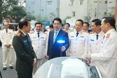 President Luong Cuong inspects equipment serving the operations of the Security Guard Force (Photo: VNA)