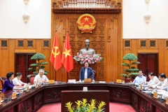 PM Pham Minh Chinh chairs the meeting of the Government’s standing members and Standing Board of the Government Party Committee on April 3. (Photo: baochinhphu.vn)