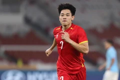 Vietnam's U23 national football team will meet Group A runners-up U23 Philippines in the 2025 ASEAN U23 Championship semifinals. (laodongthudo.vn)