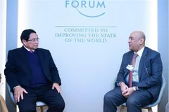 PM Pham Minh Chinh (L) and GCC Secretary-General Jasem Mohamed Albudaiwi. (Photo: VNA)