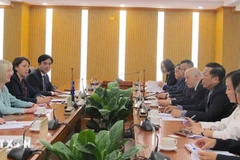 At the working session between Vietnamese Minister of Construction Tran Hong Minh and Australian Ambassador to Vietnam Gillian Bird. (Photo: VNA)
