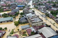 Flooded area in Aceh province, Indonesia on November 27. (Photo: Xinhua/VNA)
