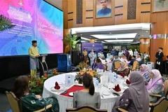 Malaysian Minister of Foreign Affairs Dato’ Seri Utama Haji Mohamad Haji Hasan addresses the meeting. (Photo published by VNA)