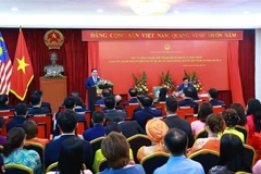 Prime Minister Pham Minh Chinh speaks at the meeting with the Vietnamese community in Malaysia on May 25. (Photo: VNA)