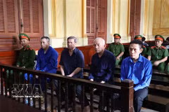 Defendants at the court (Photo: VNA)