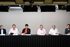 Members of the Singapore Economic Resilience Taskforce at the National Press Centre @ MDDI on July 10. (Photo: channelnewsasia.com)