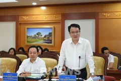 Deputy Minister of Finance Tran Quoc Phuong addresses the conference. (Photo: VNA)