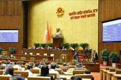 The revised Press Law is passed, with 437 out of the 440 deputies present voting in favour. (Photo: VNA)