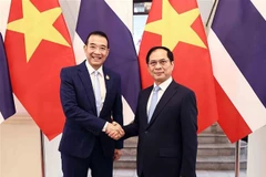 Deputy Prime Minister and Minister of Foreign Affairs Bui Thanh Son (R) and Thai Minister of Foreign Affairs Maris Sangiampongsa (Photo: VNA)