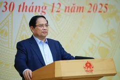 Prime Minister Pham Minh Chinh addresses the conference to review “Quang Trung Campaign” on December 30 (Photo: VNA)