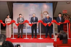 Delegates at the opening ceremony of the exhibition “Ho Chi Minh’s Footprints in the Homeland of the October Revolution” at Ho Chi Minh Museum on December 8. (Photo: VNA)
