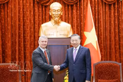 General Secretary of the Communist Party of Vietnam Central Committee and State President To Lam (R) and Belgian Ambassador Karl Van den Bossche. (Photo: VNA)