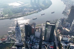 Financial buildings in central Ho Chi Minh City along the Saigon River, facing the Thu Thiem Peninsula in An Khanh ward. (Photo: VNA)