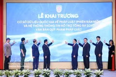 Officials launch the updated National Database on Legal Documents on April 23. (Photo: VNA)