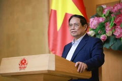 Prime Minister Pham Minh Chinh speaks at the 6th meeting of the Central Steering Committee for Elimination of Temporary and Dilapidated Houses across the nation on July 9 in Hannoi. (Photo: VNA)