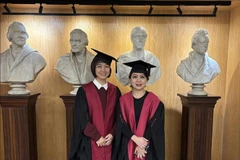 Doctors Do Thi Ngoc Linh (left) and Le Diep Linh at the RCS membership certificate award ceremony in London. (Photo: VNA)