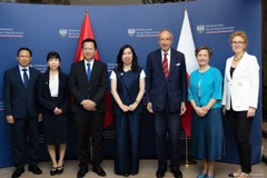 Participants of the Vietnam-Poland deputy ministerial-level political consultation in Warsaw on July 8. (Photo: VNA)