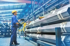 Steel pipe production at Hoa Phat Group'S factory. (Photo: hanoimoi.vn)