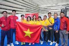 The joy of the Vietnamese karate team (Photo: VNA)