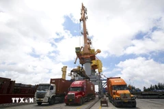 Trucks carrying export goods at Tan Vu Port in Hai Phong city (Photo: VNA)
