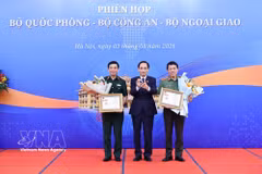 From left: Deputy Prime Minister and Minister of National Defence Gen. Phan Van Giang, Minister of Foreign Affairs Le Hoai Trung and Minister of Public Security Gen. Luong Tam Quang at the joint meeting on August 3, part of the 33rd Diplomatic Conference. (Photo: VNA)