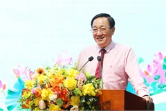 General Director of the Vietnam Bank for Social Policies, Duong Quyet Thang presides over the conference. (Photo: Vietnam+)