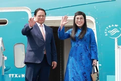 Prime Minister Pham Minh Chinh, his spouse Le Thi Bich Tran leave Hanoi on July 4 afternoon for Brazil to attend the expanded BRICS summit. (Photo: VNA)