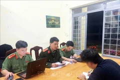 An individual is summoned at the Lam Dong police station (Photo: VNA)