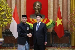 State President Luong Cuong (right) and newly appointed Ambassador of Indonesia Adam Mulawarman Tugio (Photo: VNA)